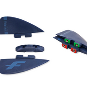 Blue surfboard fins with visible branding on a white background
